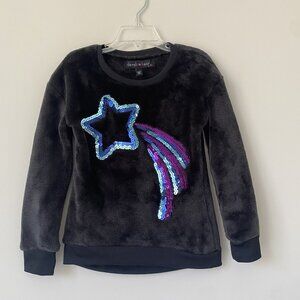 Derek Heart girls' black fuzzy sweater  with a sequin star motif